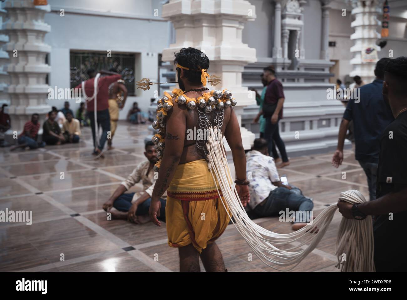 Georgetown, Penang, Malaysia - February 05, 2023: Hindu devotee with ropes hooked on the back in the Waterfall Hill Temple at Thaipusam festival Stock Photo