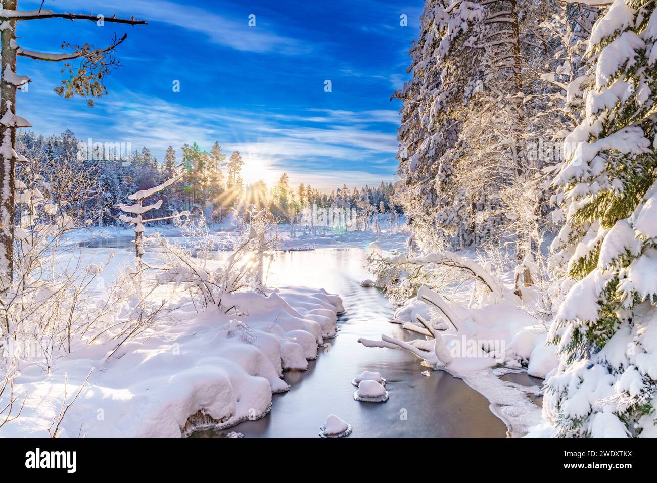 Stream flowing through icy hi-res stock photography and images - Alamy