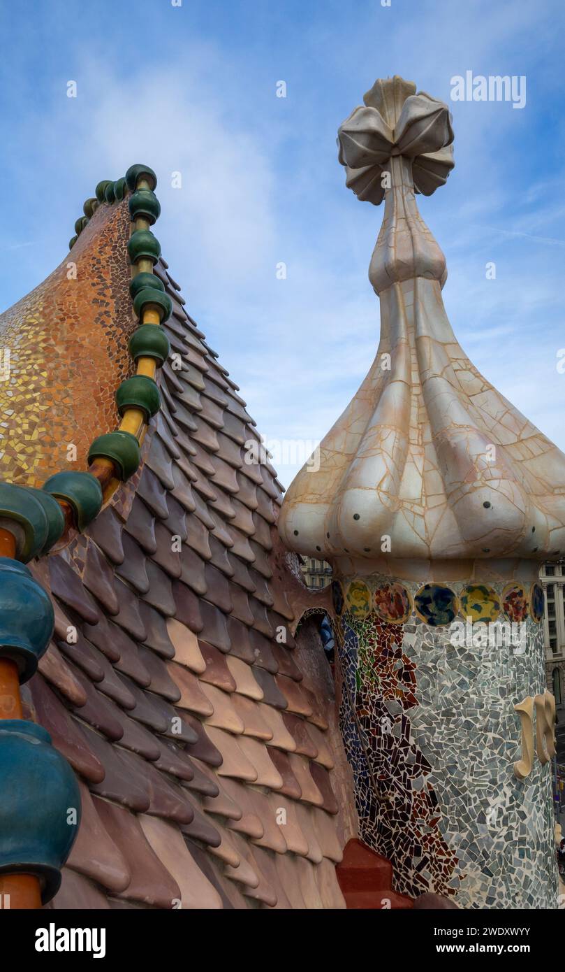 Casa Batllo roof dragon like ceramics detail with Passeig de Gracia below Stock Photo