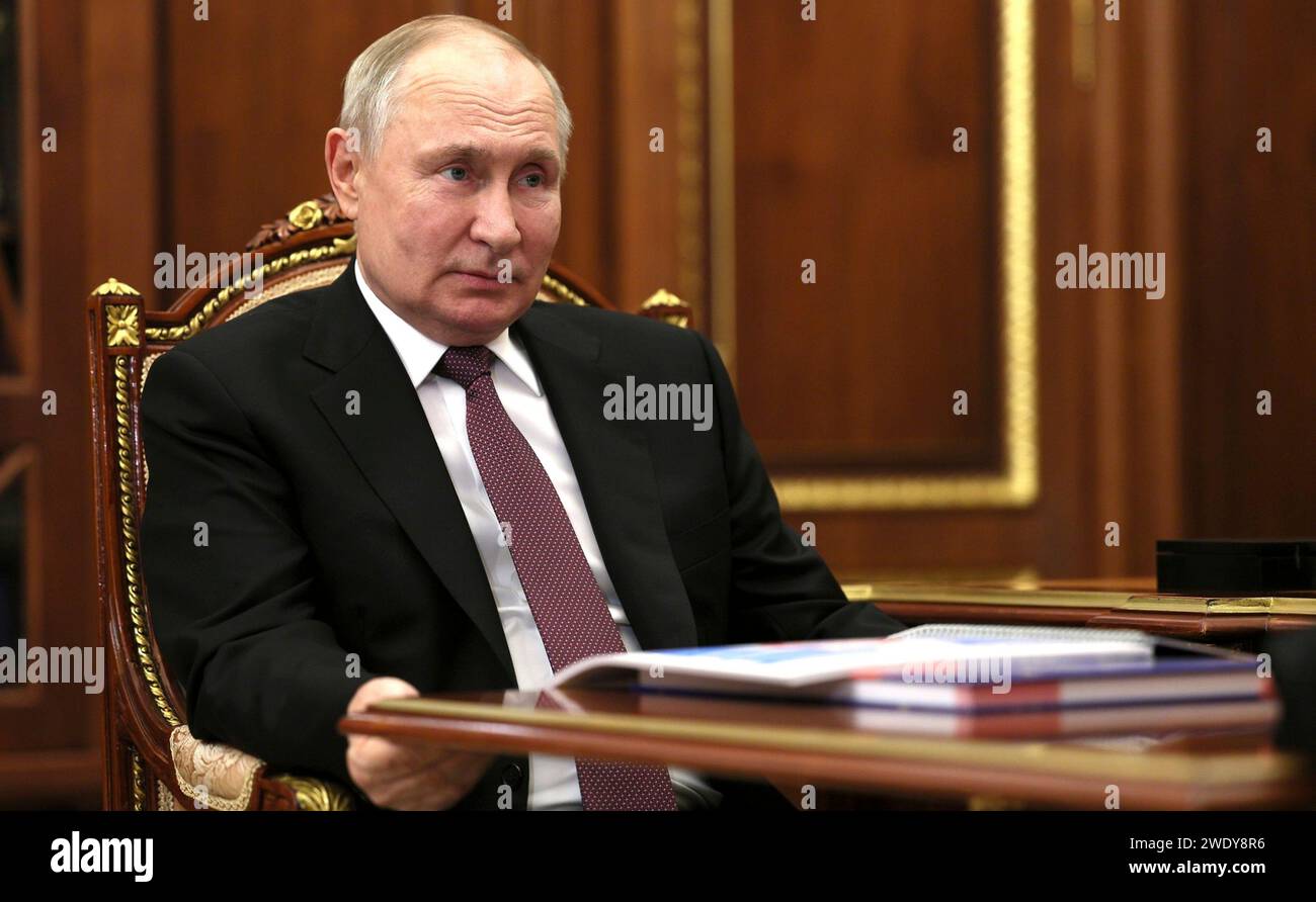 Moscow, Russia. 22nd Jan, 2024. Russian President Vladimir Putin listens to Russian Federation of Independent Trade Unions head Mikhail Shmakov during a face-to-face meeting at the Kremlin, January 22, 2024 in Moscow, Russia. Credit: Gavriil Grigorov/Kremlin Pool/Alamy Live News Stock Photo