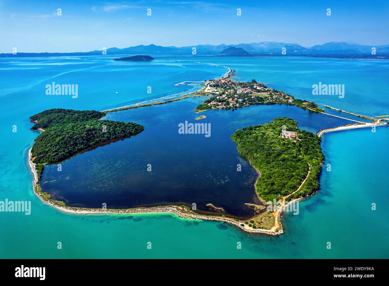 This is not some kind of atoll in the Indian or the Pacific Ocean. It is Koronissia island in the Ambracian ('Amvrakikos') gulf, Arta, Epirus, Greece. Stock Photo