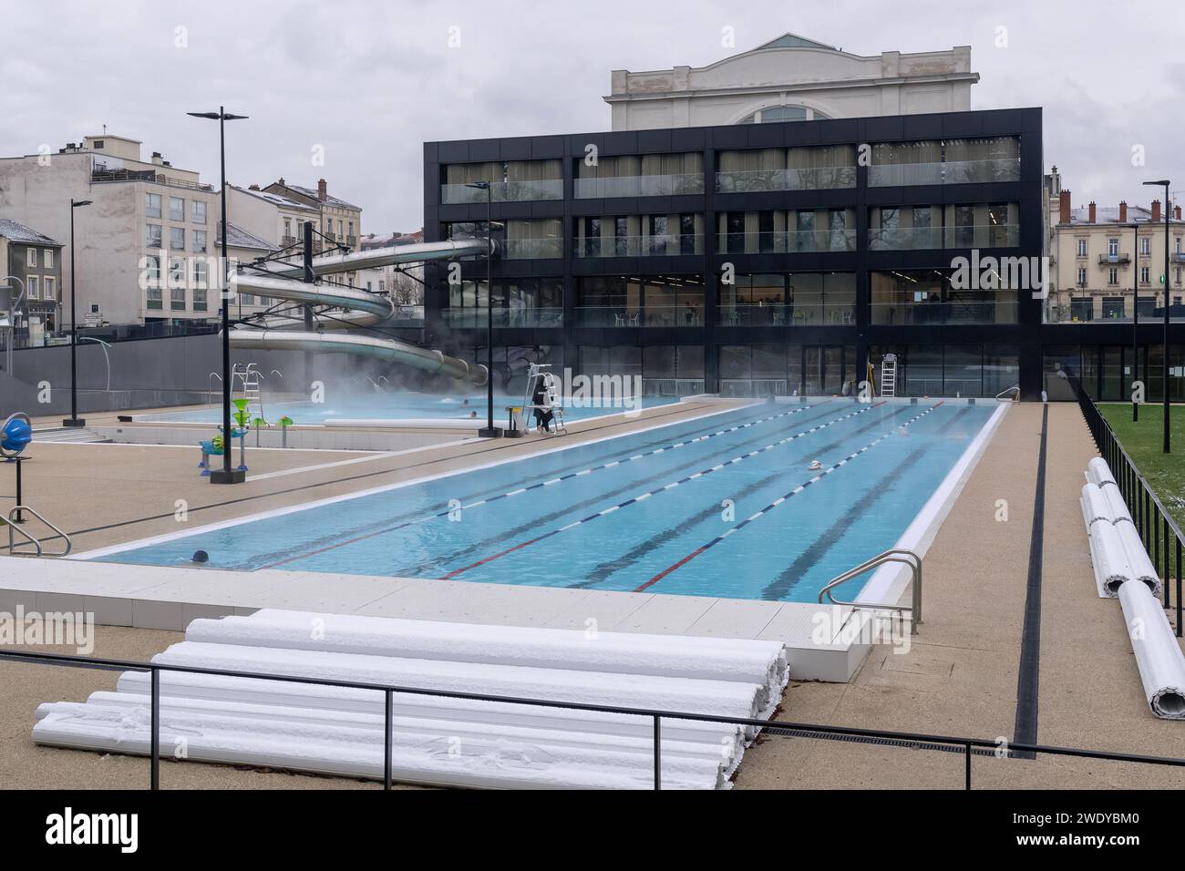 Nancy, France - Focus on the outdoor swimming pools of the Nancy Thermal complex with their hot water coming from the thermal spring. Stock Photo