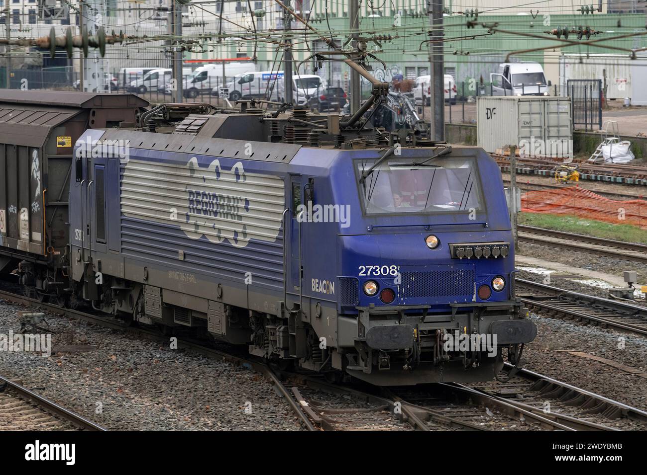 Nancy, France - Blue electric locomotive SNCF Class BB 27300 crossing Nancy station. Stock Photo