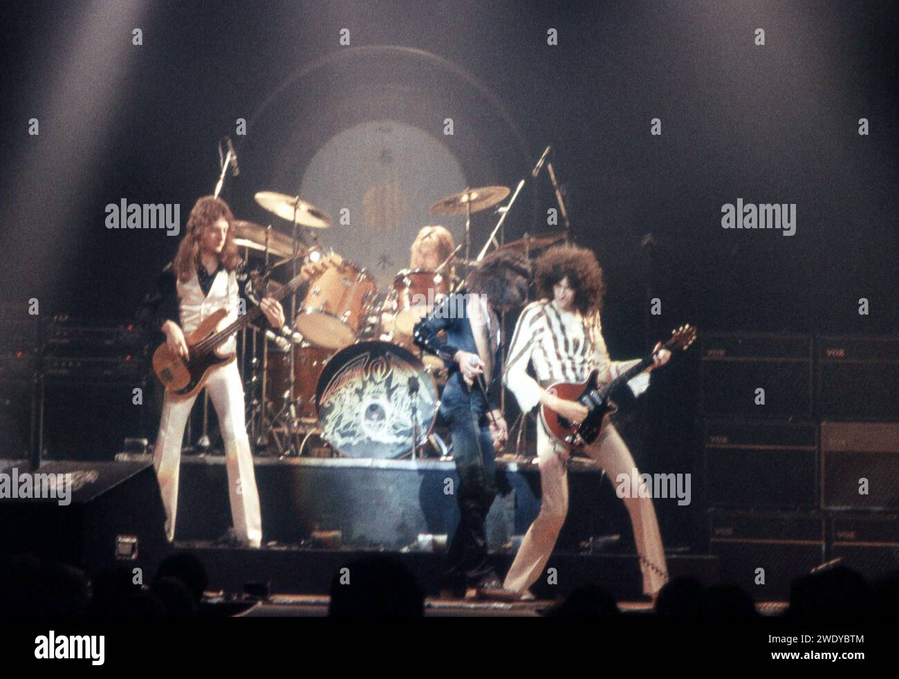 Freddie Mercury, Brian May, and Roger Taylor of Queen in concert in ...