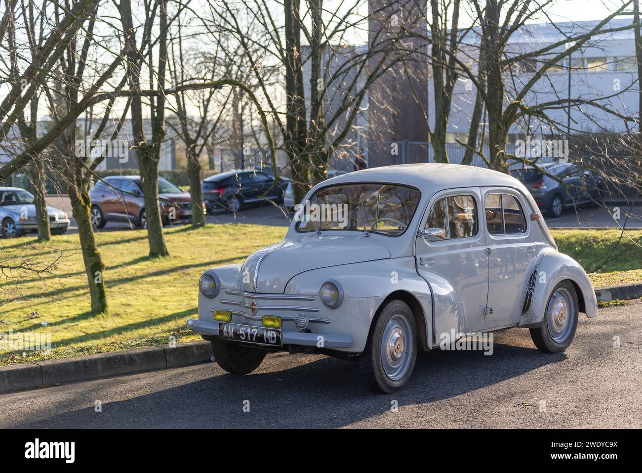 Nancy, France - White Renault 4CV parked in a parking lot. Stock Photo