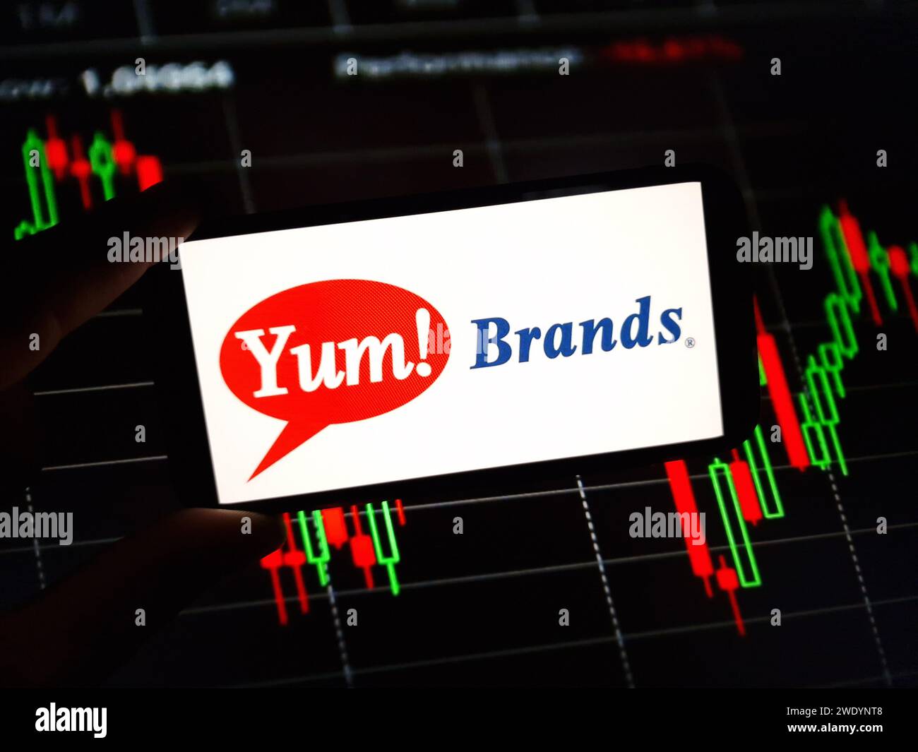Konskie, Poland - January 22, 2024: Yum Brands company logo displayed on mobile phone screen Stock Photo