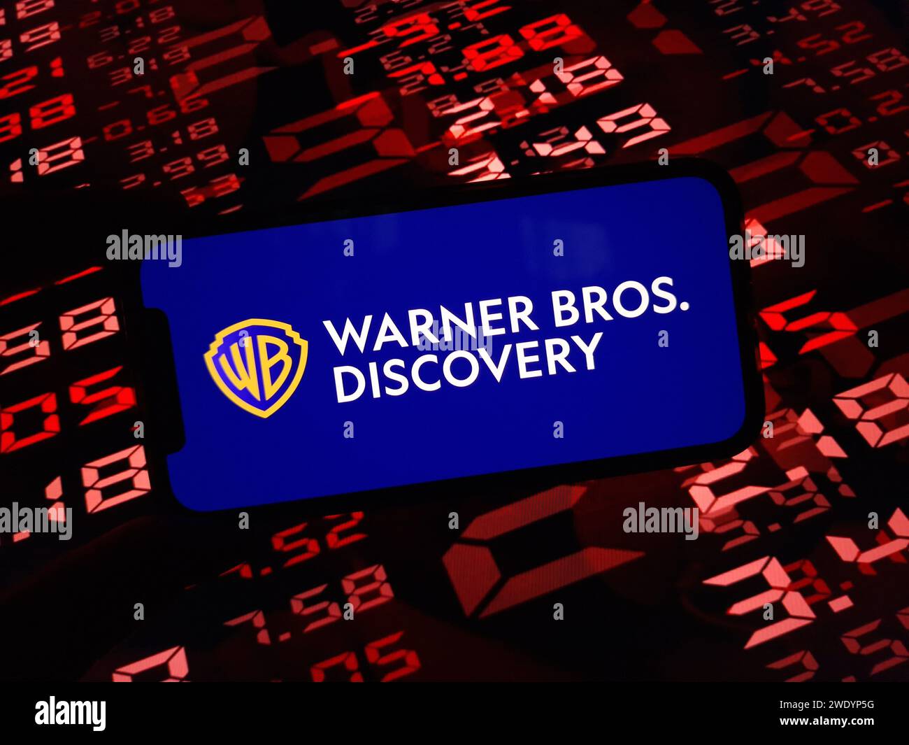 Konskie, Poland - January 22, 2024: Warner Bros Discovery company logo displayed on mobile phone screen Stock Photo