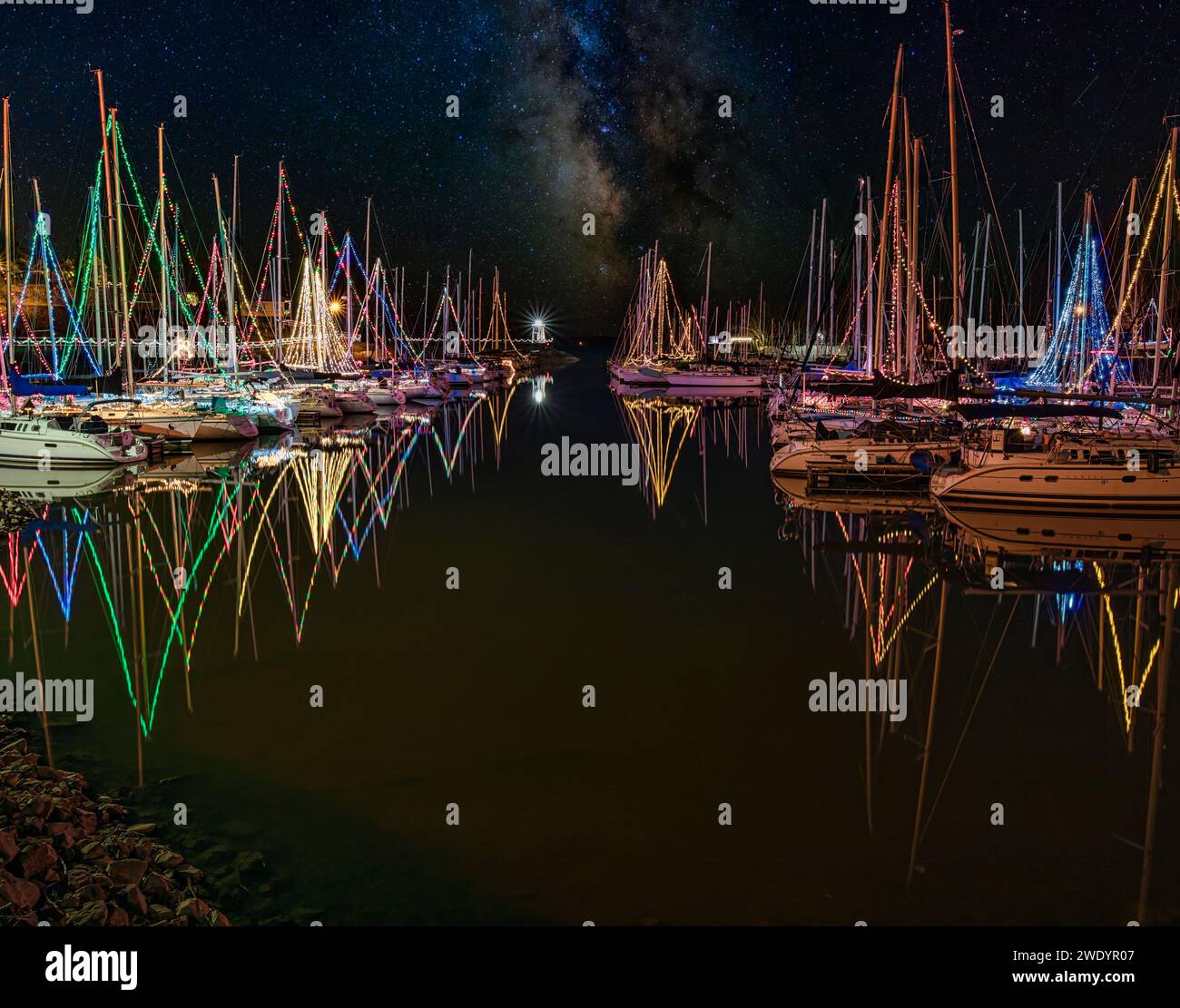 Sailboats decorated in Christmas lights on Kentucky Lake at Lighthouse
