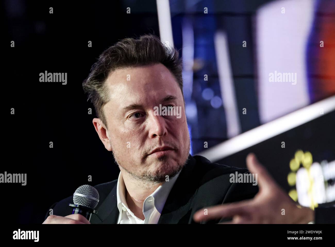 American billionaire, Elon Musk talks during a conversation with Ben Shapiro, a Jewish political journalist and broadcaster about antisemitism online during the European Jewish Association (EJA) symposium in the Conference Centre of Doubletree Hilton hotel in Krakow, Poland on January 22, 2024. Elon Musk visited Poland on the invitation of EJA to show his support to Jewish fight against antisemitism. Elon Musk was accused of antisemitism after some antisemitic posts were published on X platform. Stock Photo