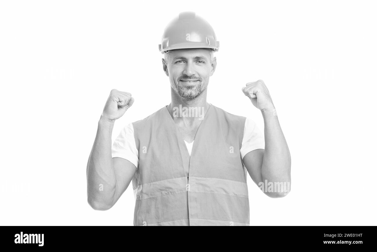 photo of glad man engineer wearing reflective vest. man engineer isolated on white. Stock Photo