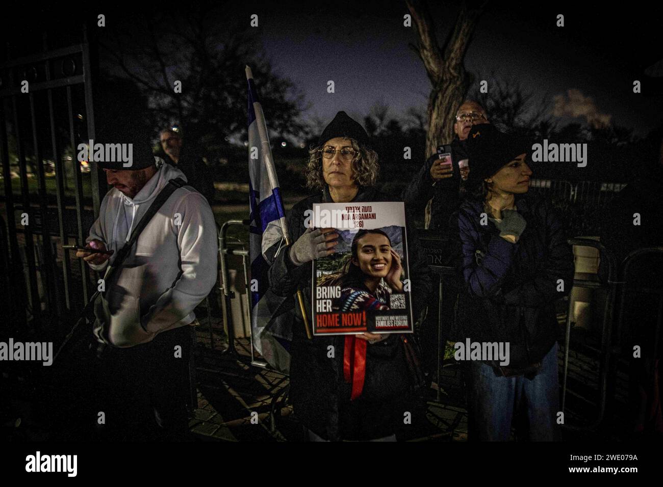Caesarea, Israel. 20th Jan, 2024. A woman holds a placard of Noa Argamani who is held as a hostage by Hamas in Gaza during a protest outside the home of Prime Minister Benjamin Netanyahu. The US, Egypt and Qatar are pushing Israel and Hamas to accept a comprehensive plan that would end the war, see the release of hostages held in Gaza, and ultimately lead to full normalization for Israel with its neighbors and talks for the establishment of a Palestinian state, The Wall Street Journal reported on Sunday. (Credit Image: © Eyal Warshavsky/SOPA Images via ZUMA Press Wire) EDITORIAL USAGE ONLY! Stock Photo