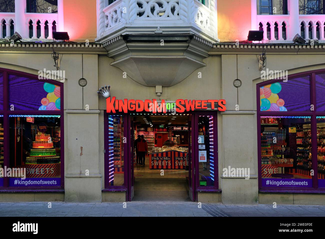 Kingdom of Sweets confectionery store, with colourful lighting, Queen