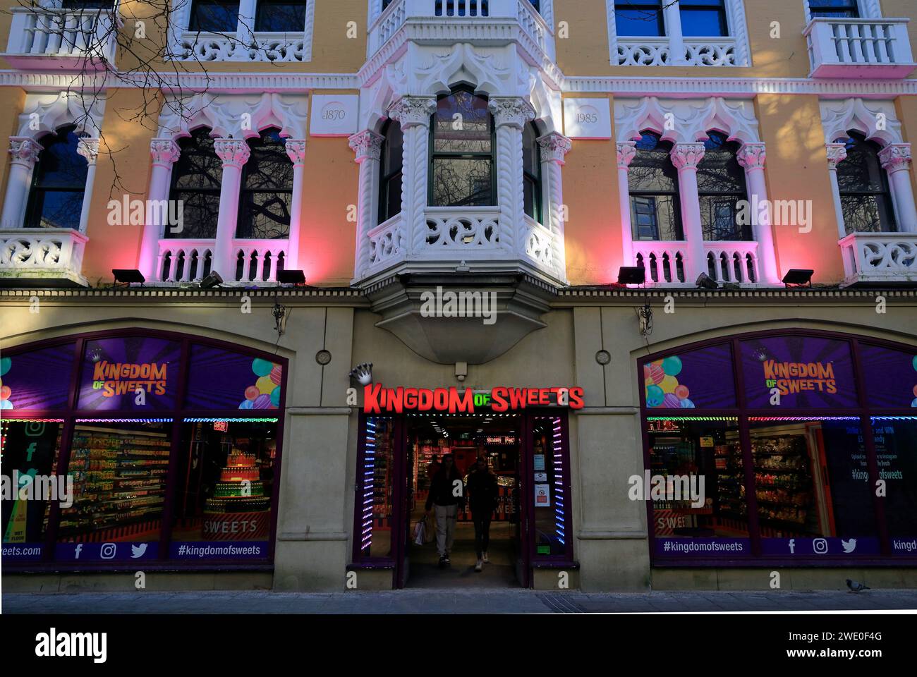 Kingdom of Sweets confectionery store, with colourful lighting, Queen