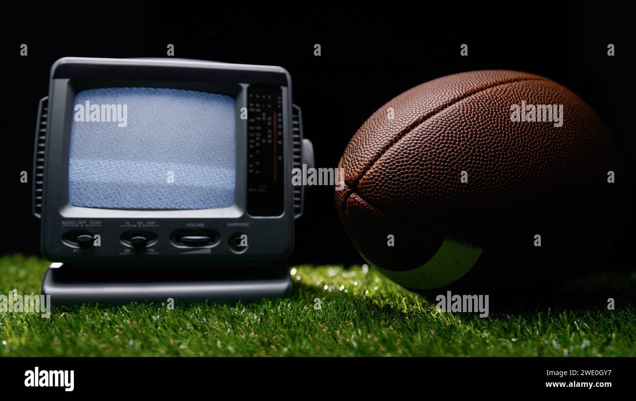 static television background with football ball Stock Photo
