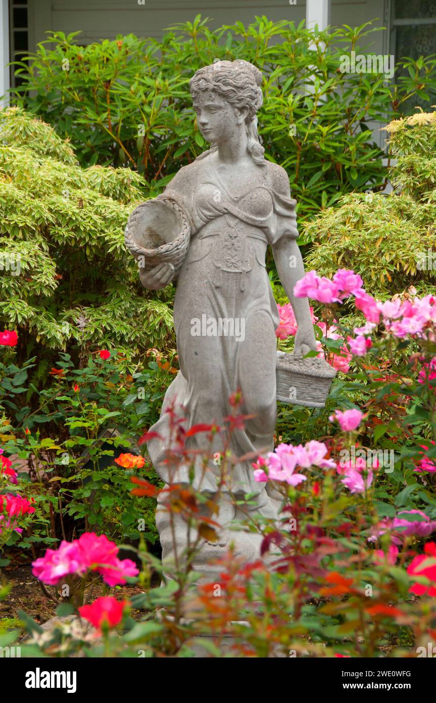 Statue in roses, Hulda Klager Lilac Garden, Woodland, Washington Stock Photo