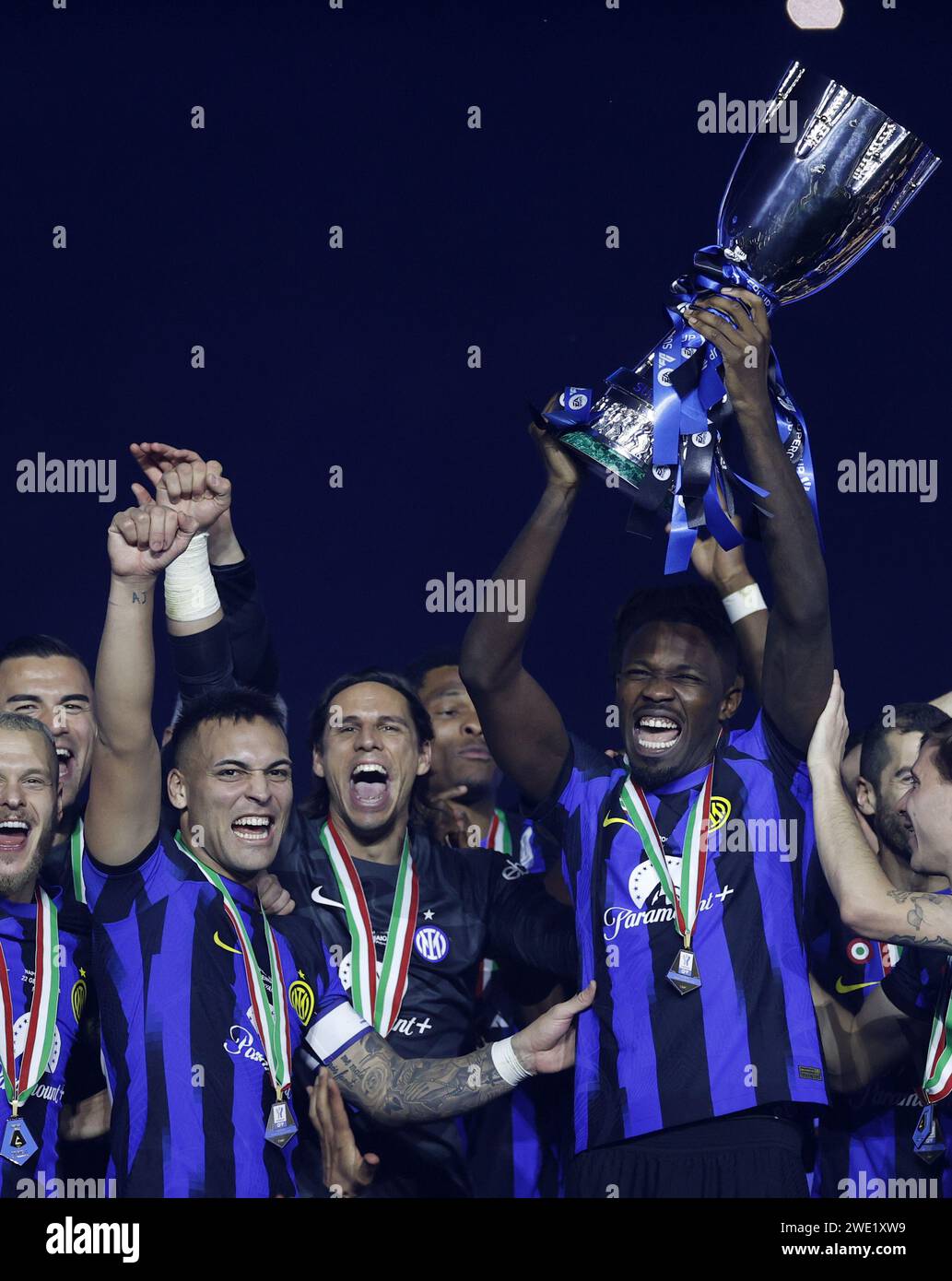 Riyadh. 23rd Jan, 2024. Inter Milan's Marcus Thuram (R) lifts the