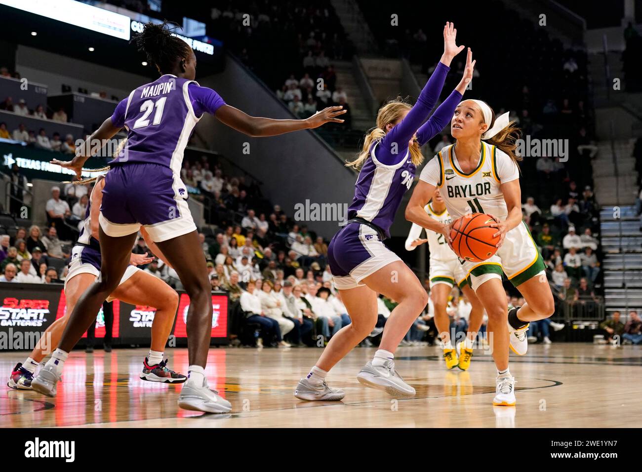 Baylor guard Jada Walker (11) works to get to the basket against Kansas ...