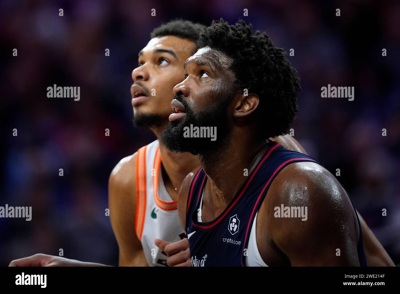 Philadelphia 76ers' Joel Embiid, right, and San Antonio Spurs' Victor