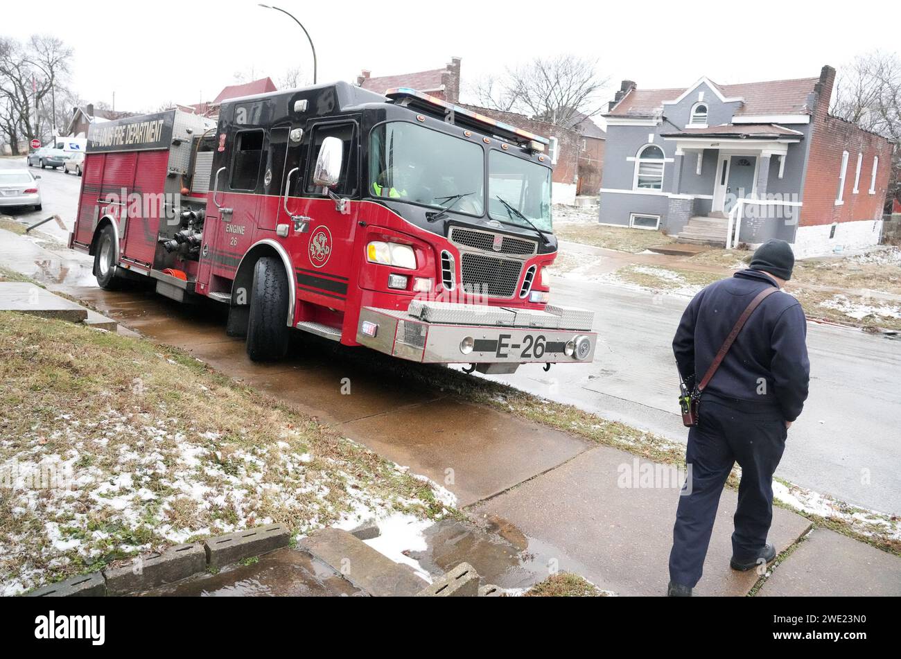 St Louis United States 26th Jan 2024 A St Louis Firefighter   St Louis United States 26th Jan 2024 A St Louis Firefighter Inspects His Truck For Damage After Sliding Down A Ice Covered Street Crashing Into A Car And Ending Up On The Sidewalk After Freezing Rains Coated The Streets Of St Louis On Monday January 22 2024 The Truck Was Finally Able To Return To Service Following The Salting Of The Street Photo By Bill Greenblattupi Credit Upialamy Live News 2WE23N0 