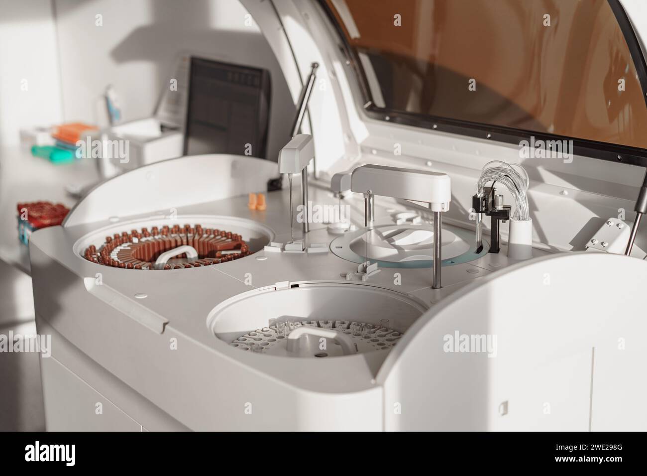 Microcentrifuge machine with test tubes standing in research laboratory