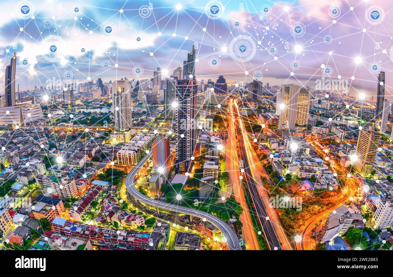 Modern city at twilight with network connection wireless communication concept Stock Photo