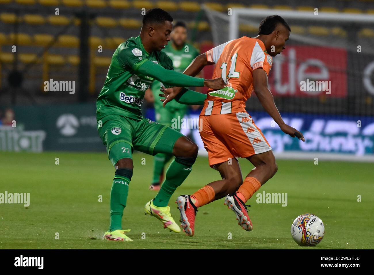 Bogota, Colombia. 22nd Jan, 2024. Equidad's David Camacho (L) and Envigado's David Camacho fight for the ball during the Equidad vs Envigado match for the Betplay Dimayor league in the Techo stadium in Bogota, Colombia, January 22, 2024. Photo by: Cristian Bayona/Long Visual Press Credit: Long Visual Press/Alamy Live News Stock Photo