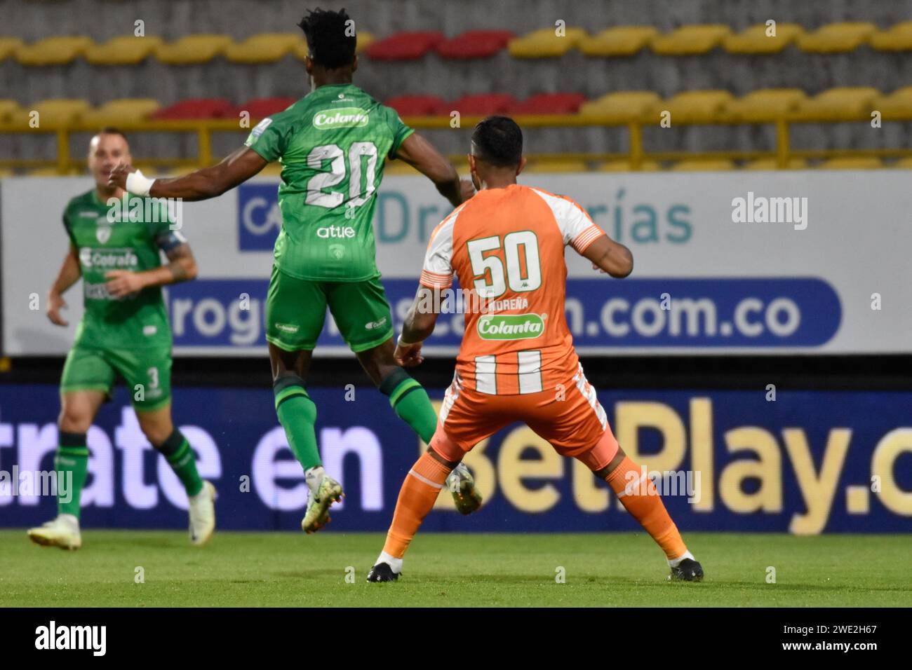 Bogota, Colombia. 22nd Jan, 2024. Equidad's Jose Lloreda and Envigado's Santiago Norena fight for a head shot during the Equidad vs Envigado match for the Betplay Dimayor league in the Techo stadium in Bogota, Colombia, January 22, 2024. Photo by: Cristian Bayona/Long Visual Press Credit: Long Visual Press/Alamy Live News Stock Photo