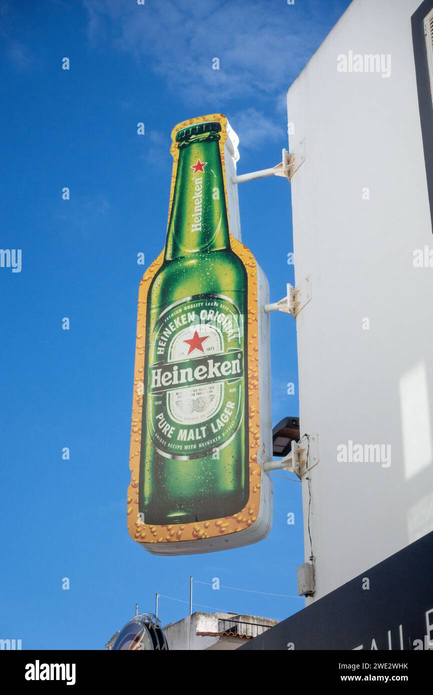 Large Heineken Beer Bottle Sign On A Building In Albufeira Portugal, January 20, 2024 Stock Photo