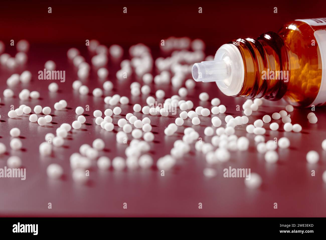Homeopathic globules on a plain surface, natural medicine, alternative medicine, studio photo, 23.01.2024 Stock Photo