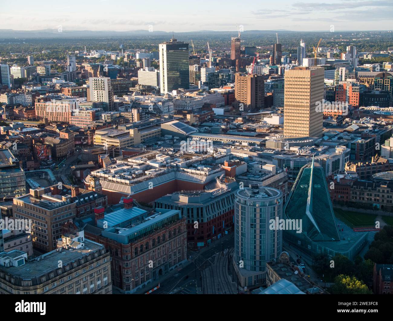 Aerial image of Indigo Hotel, National Football Museum at Urbis, Corn Exchange, Arndale House, City Tower, Bloc & the wider Manchester city centre, UK Stock Photo
