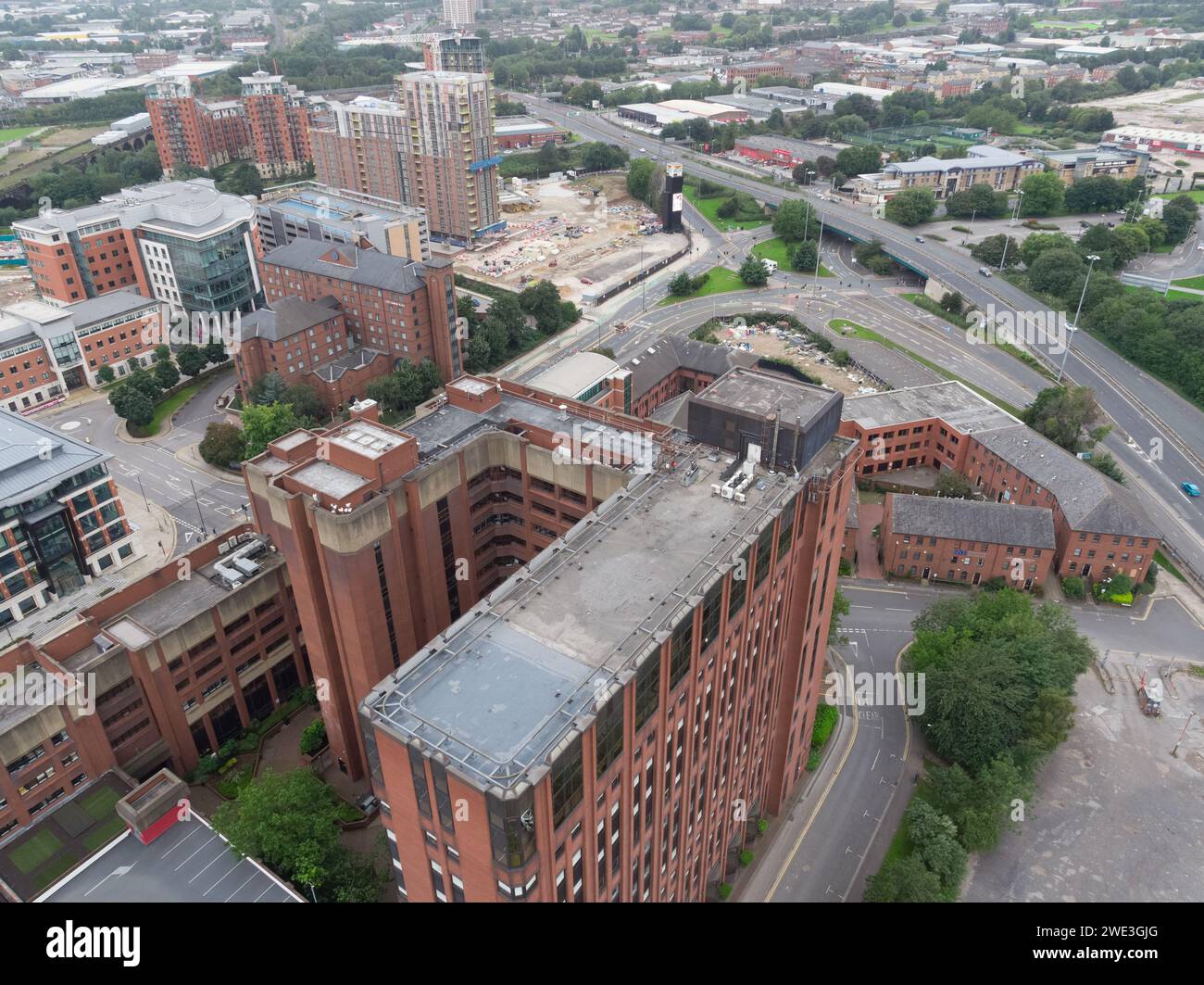 Aerial photograph of West One, Leeds city centre, Yorkshire, UK in the foreground, Leeds Inner Ring Road & The Headline apartments under construction Stock Photo
