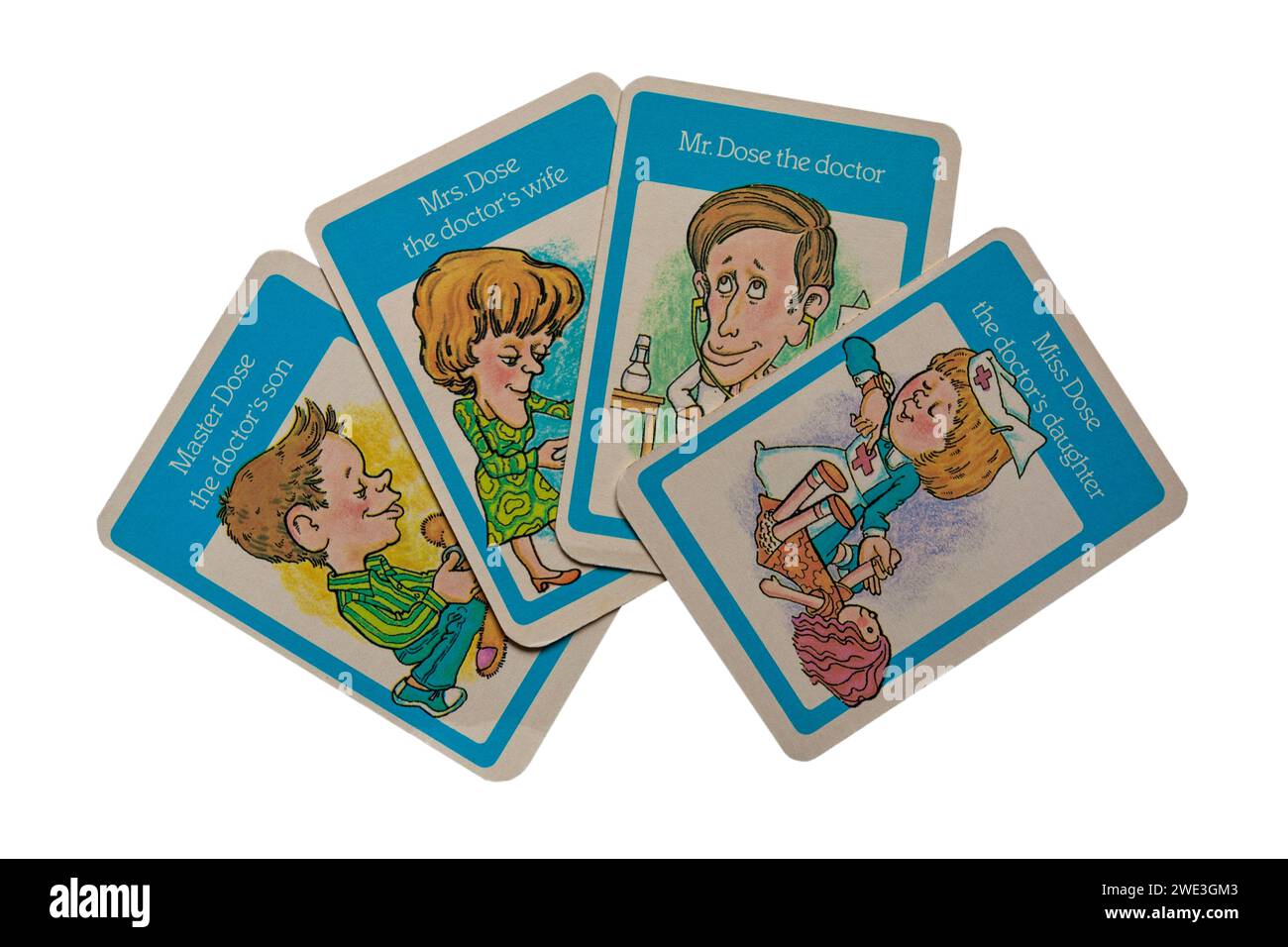 old retro Happy Families playing cards isolated on white background - the Dose Family, Mr Dose the Doctor with wife, son and daughter - UK Stock Photo