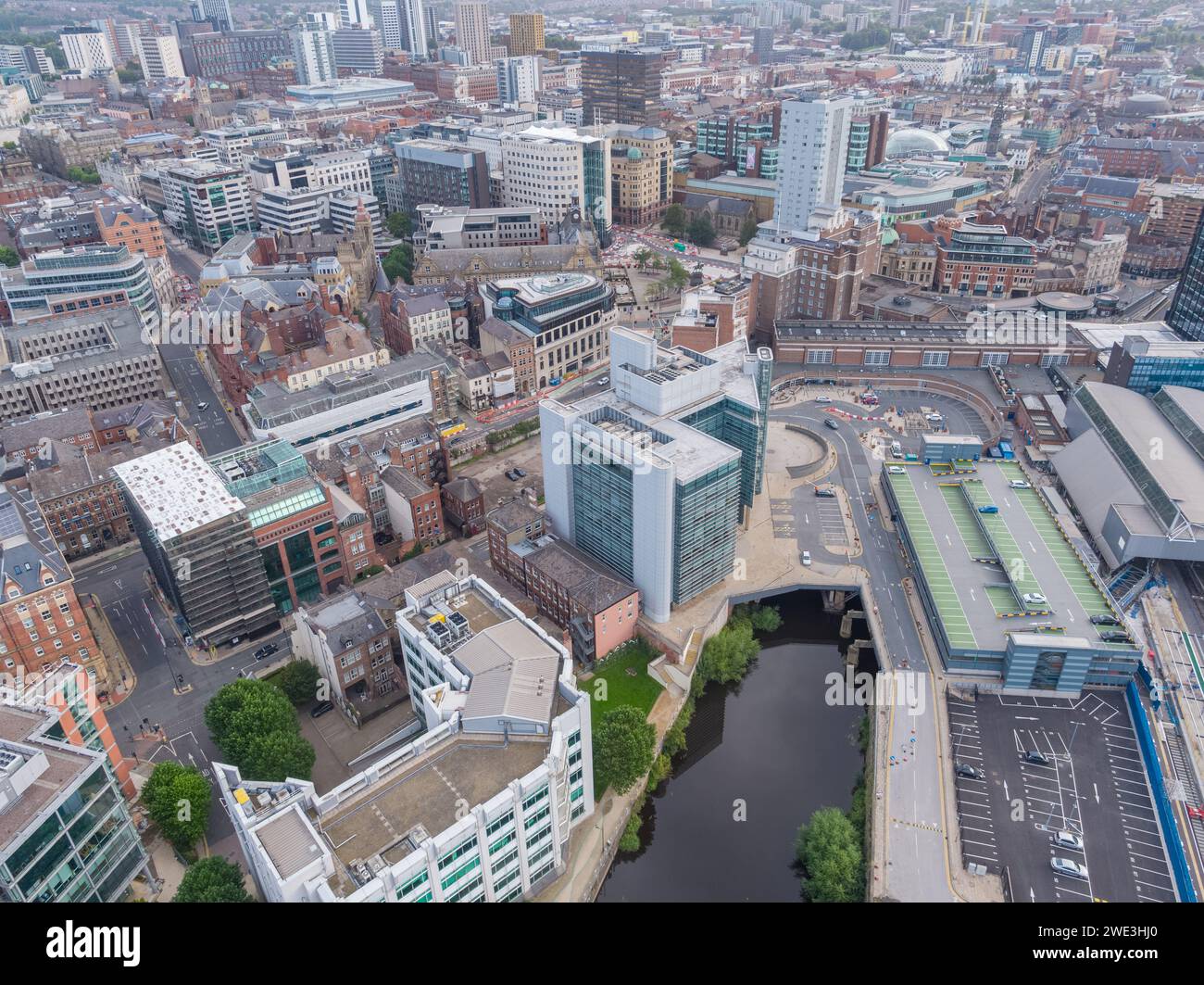 Aerial image over the River Aire with Park Plaza, Whitehall Quay, City Square, Majestic Queens Hotel and wider city centre, Yorkshire, UK Stock Photo