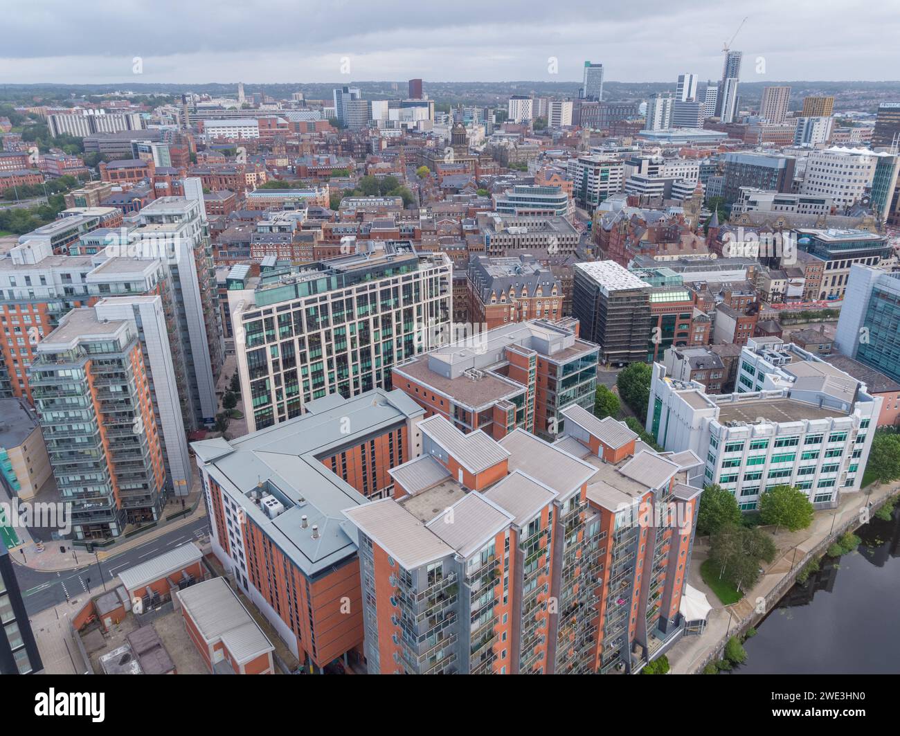 Aerial image of Bank House, West Point, Whitehall Quay, Leeds Town Hall over the River Aire in Leeds city centre, Yorkshire, UK Stock Photo