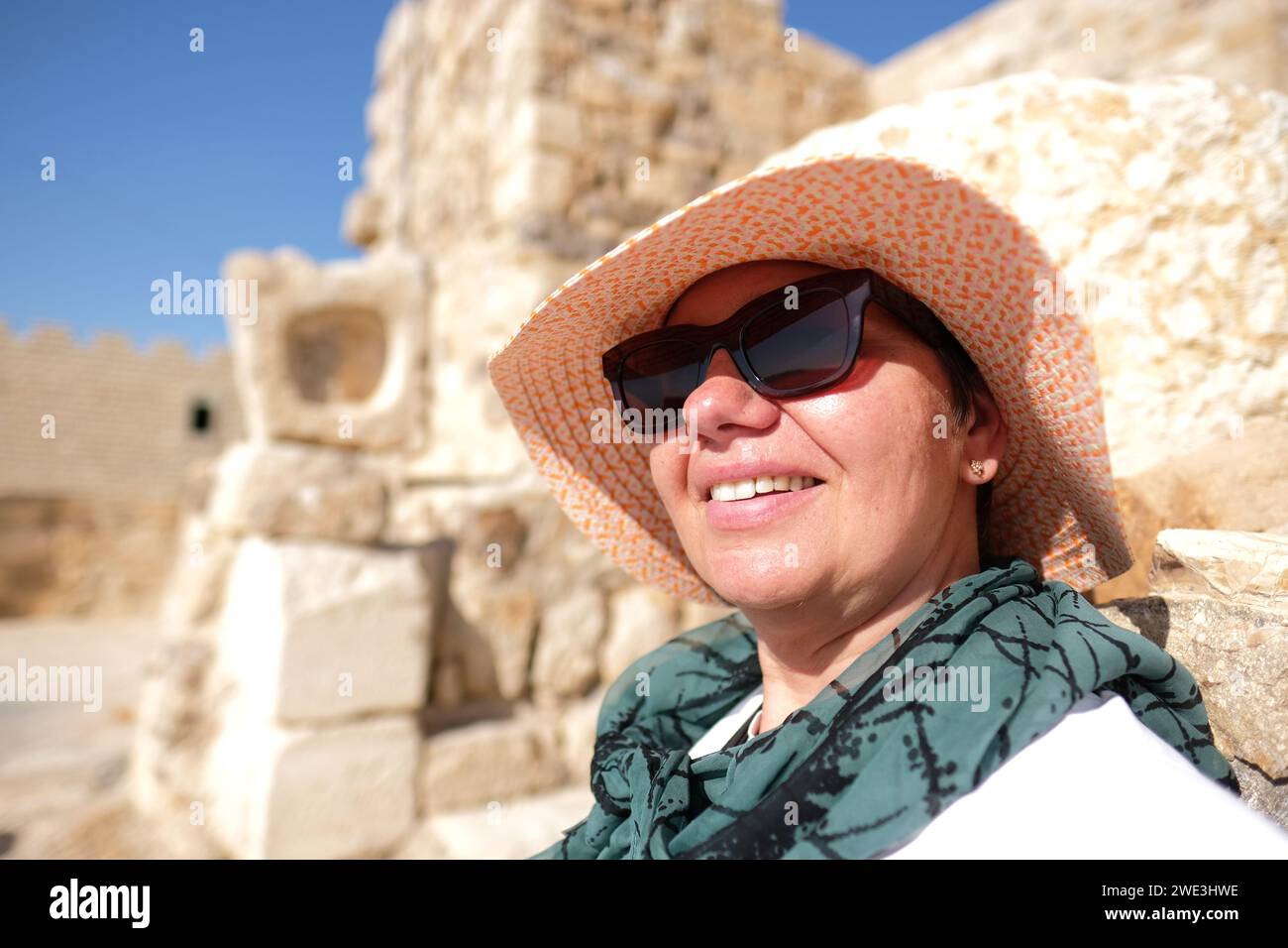 Jordan a female tourist enjoys a visit to the ancient 12th century castle at Karak ( Al-Karak ) Stock Photo