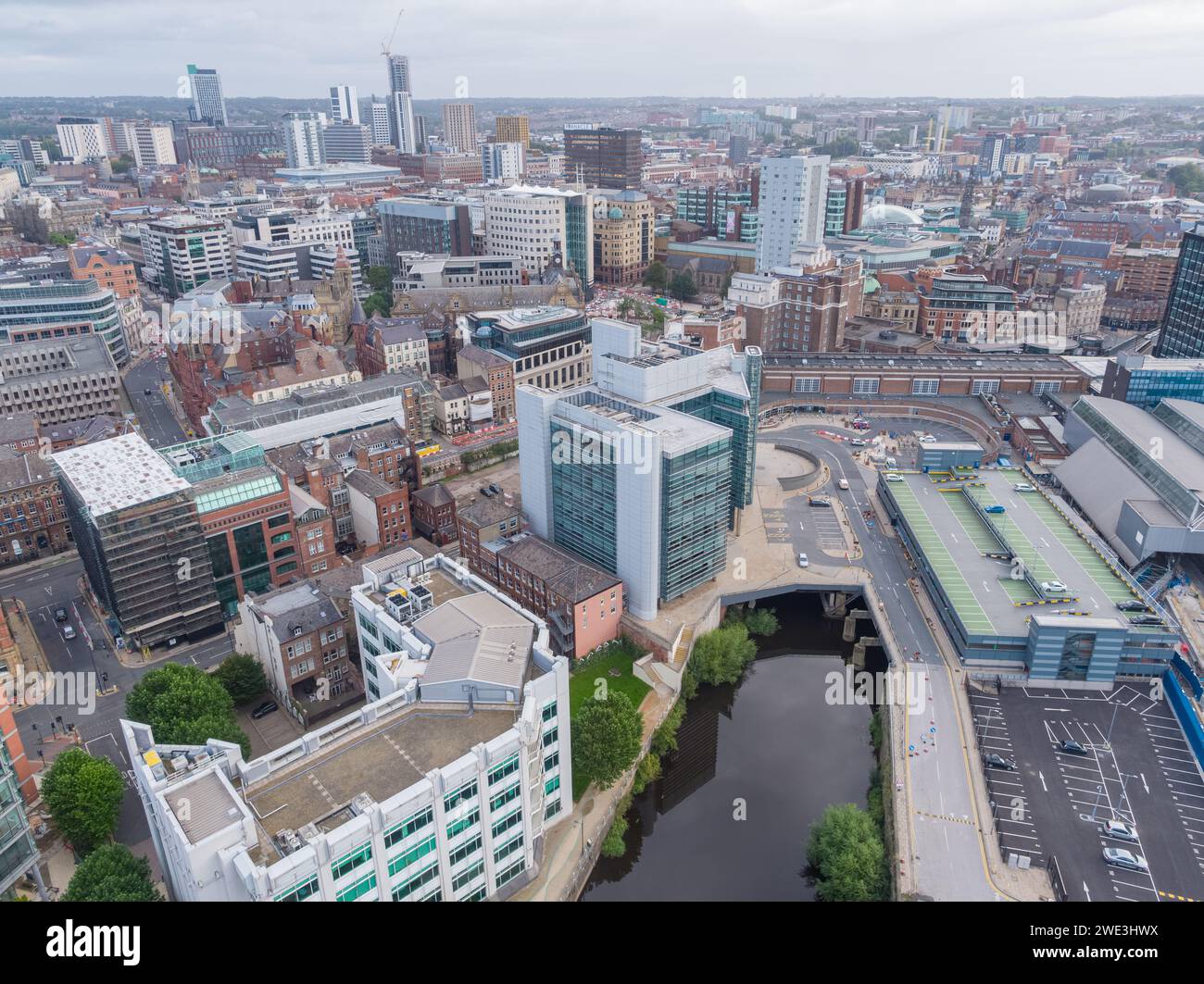Aerial image of Leeds city centre, Yorkshire, UK taken over the River Aire including City Square, The Majestic, Queens Hotel, Whitehall Quay Stock Photo