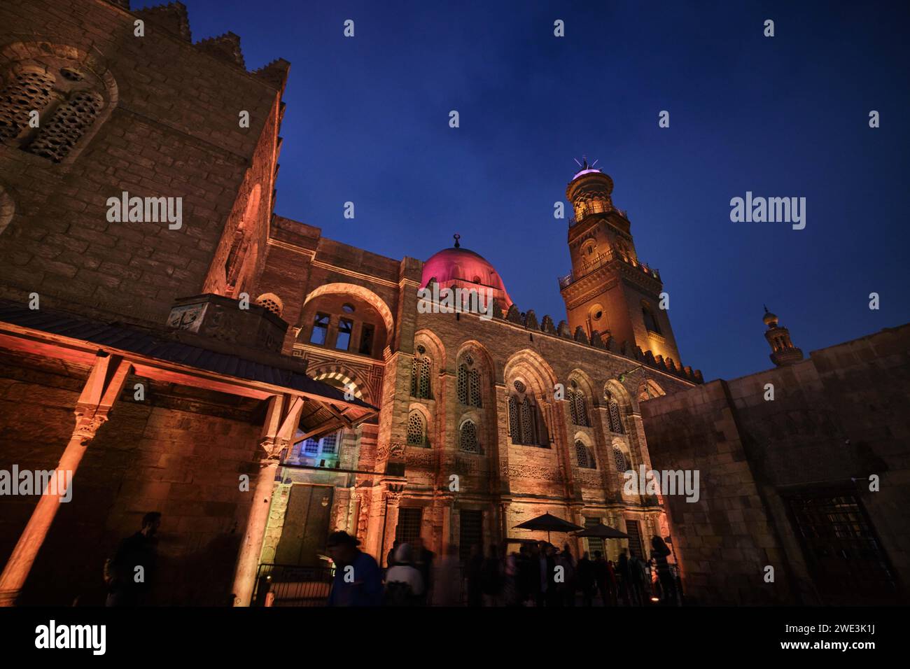 Cairo, Egypt - December 24 2023: The Qalawun complex is a massive pious complex in Al-Muizz Street,  Old Cairo Stock Photo