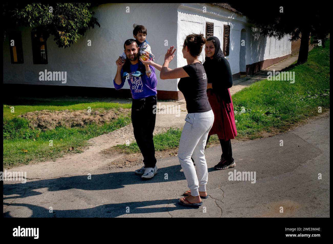 Image ©Licensed to Parsons Media. 22/09/2015.Croatia. Migrants in Croatia. Migrant children.   Croatia. Migrants walking in the village of Bapska, Croatia, after just crossing the Border from Serbia into Croatia as they make their way to Hungary.  Picture by Andrew Parsons / Parsons Media Stock Photo