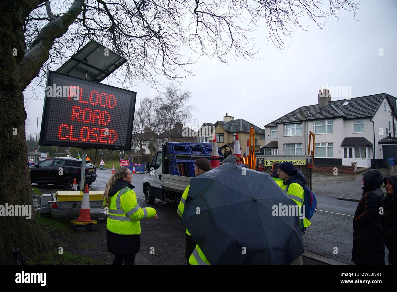 A temporary flood barrier system is put in place in Queens Drive in the