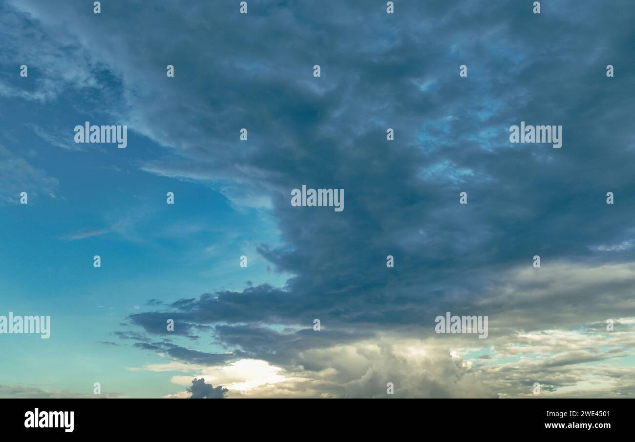 Beautiful blue sky and cumulus clouds abstract background. Cloudscape background. Blue sky and fluffy clouds. World Ozone Day. Ozone layer. Overcast Stock Photo