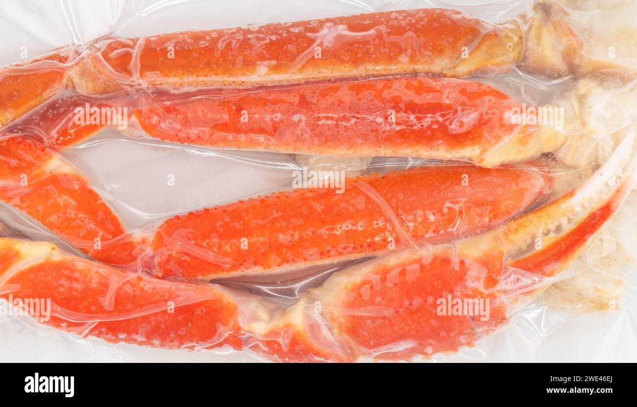 Vacuum packaged Peruvian Southern King crab leg texture background