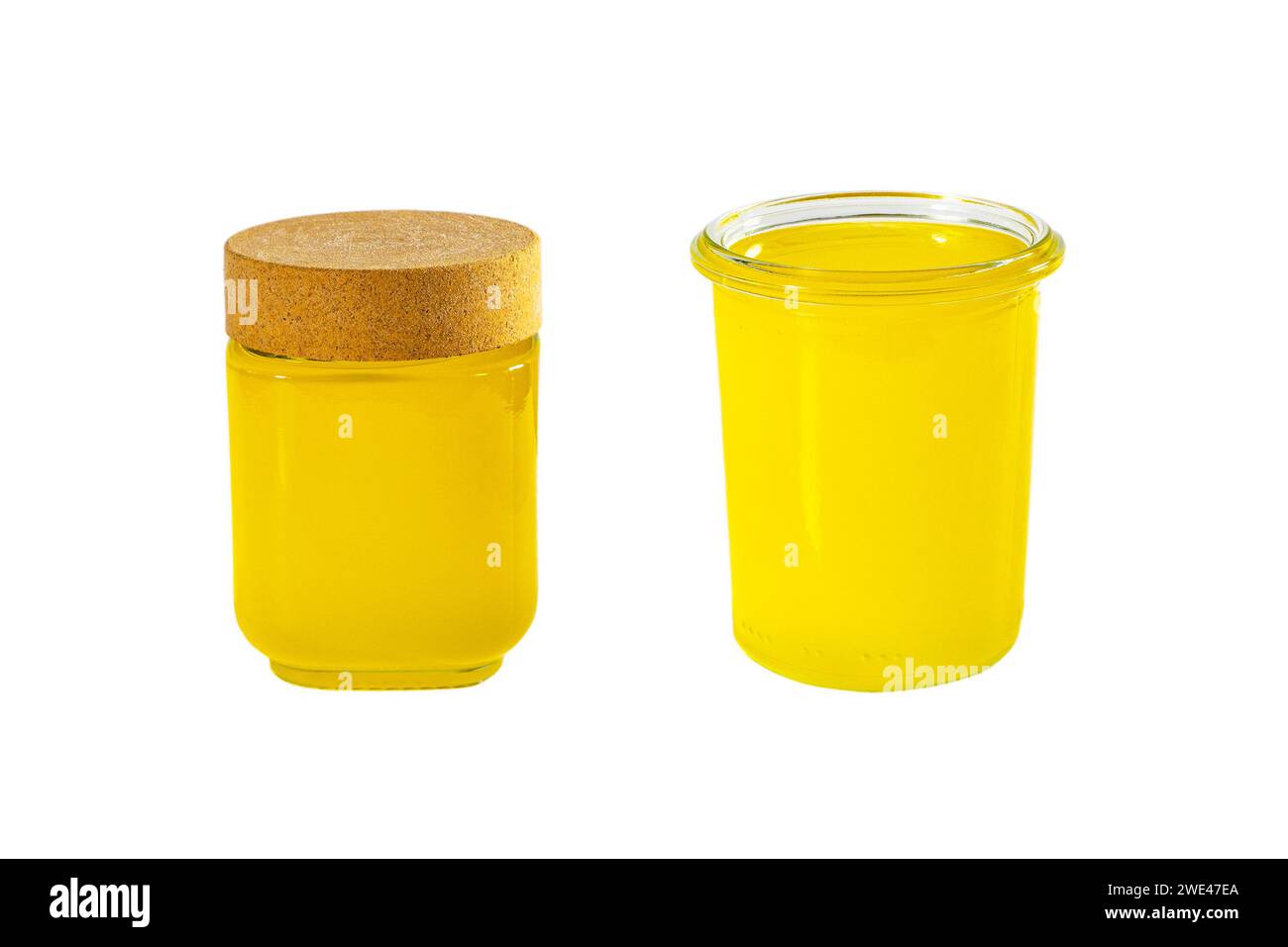 Clarified butter in jar, cooking oil, pure ghee isolated on white ...