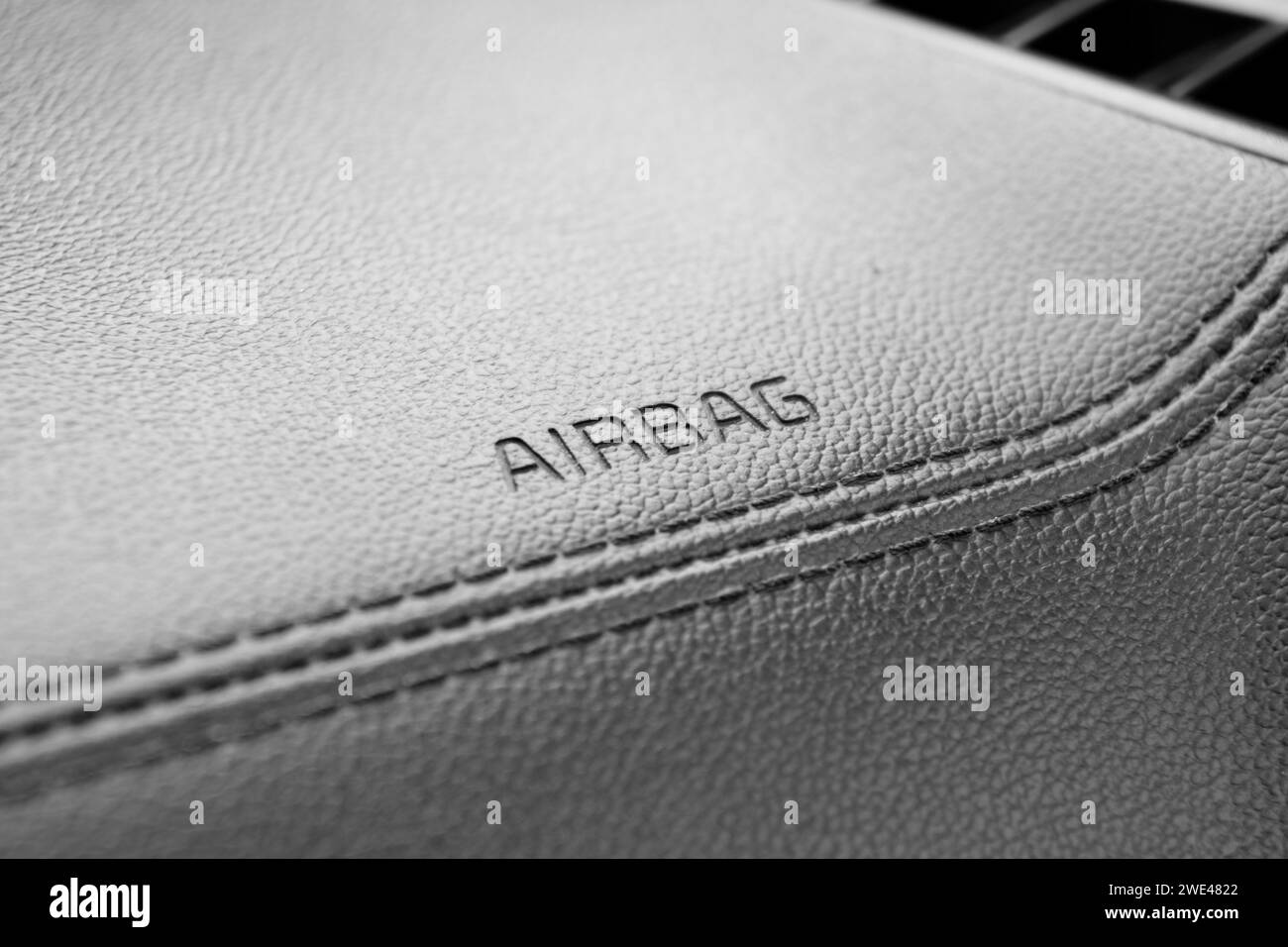 Car black leather interior. Part of leather car cockpit details with