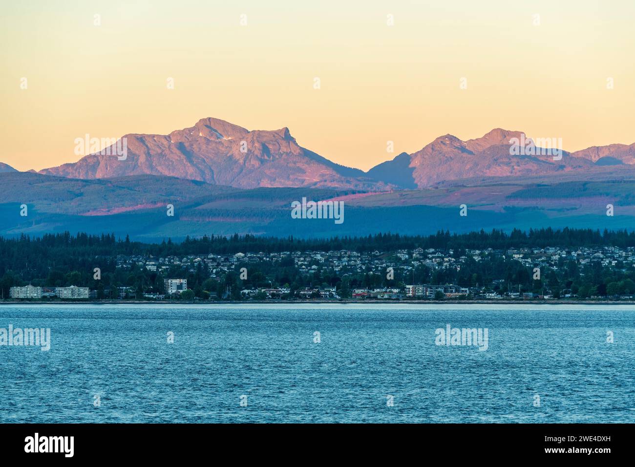 Campbell River at sunrise seen from Quadra Island, Vancouver Island, British Columbia, Canada. Stock Photo