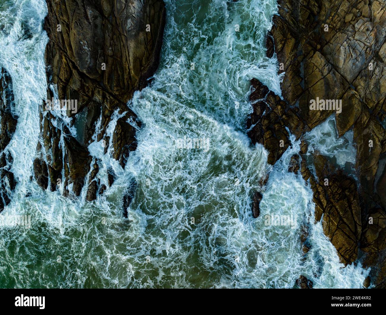 Bird eye view seashore with big wave crashing on rock cliff. Beautiful ...