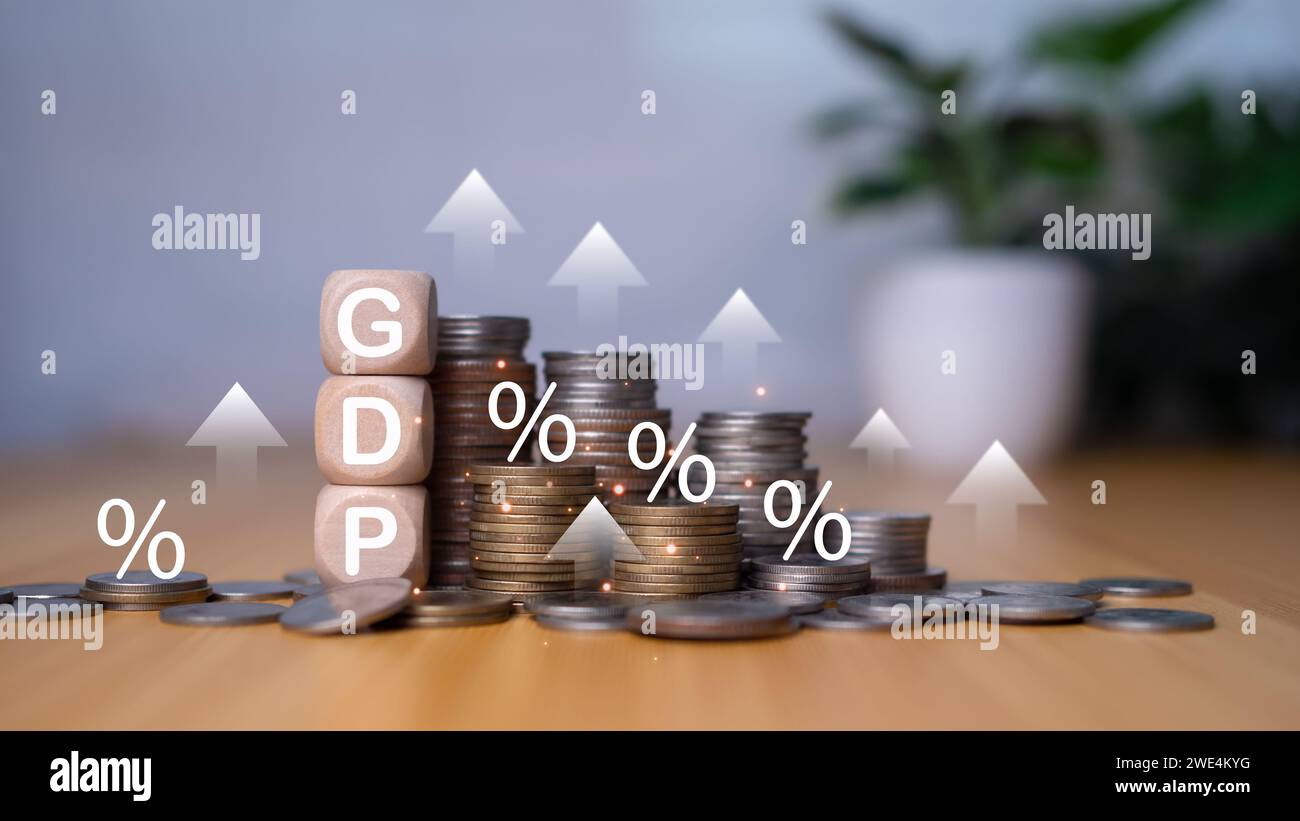 Gross domestic product, Financial, Management, Economic, Inflation, recession and Money concepts, GDP block with Coins stack and UP and Down arrow sym Stock Photo