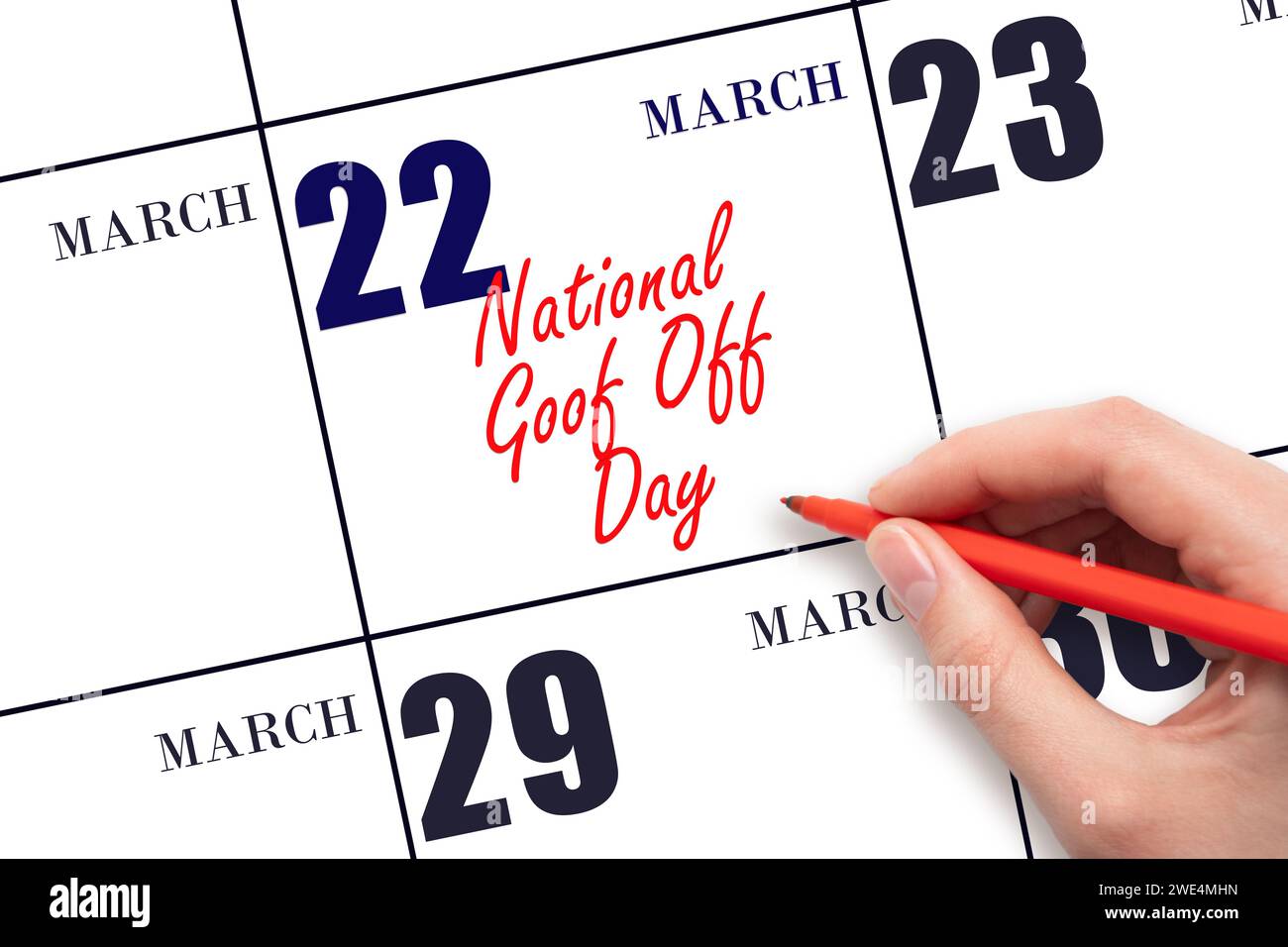 March 22. Hand writing text National Goof Off Day on calendar date. Save the date. Holiday.  Day of the year concept. Stock Photo