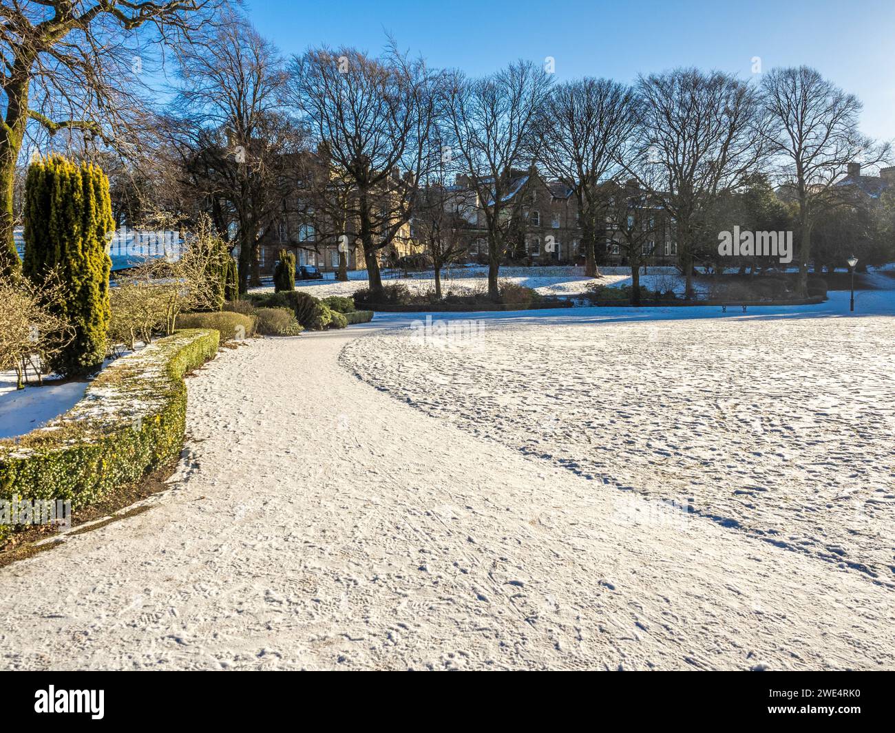 Pavilion Gardens in the snow on a sunny winter day. Buxton, Derbyshire. Stock Photo