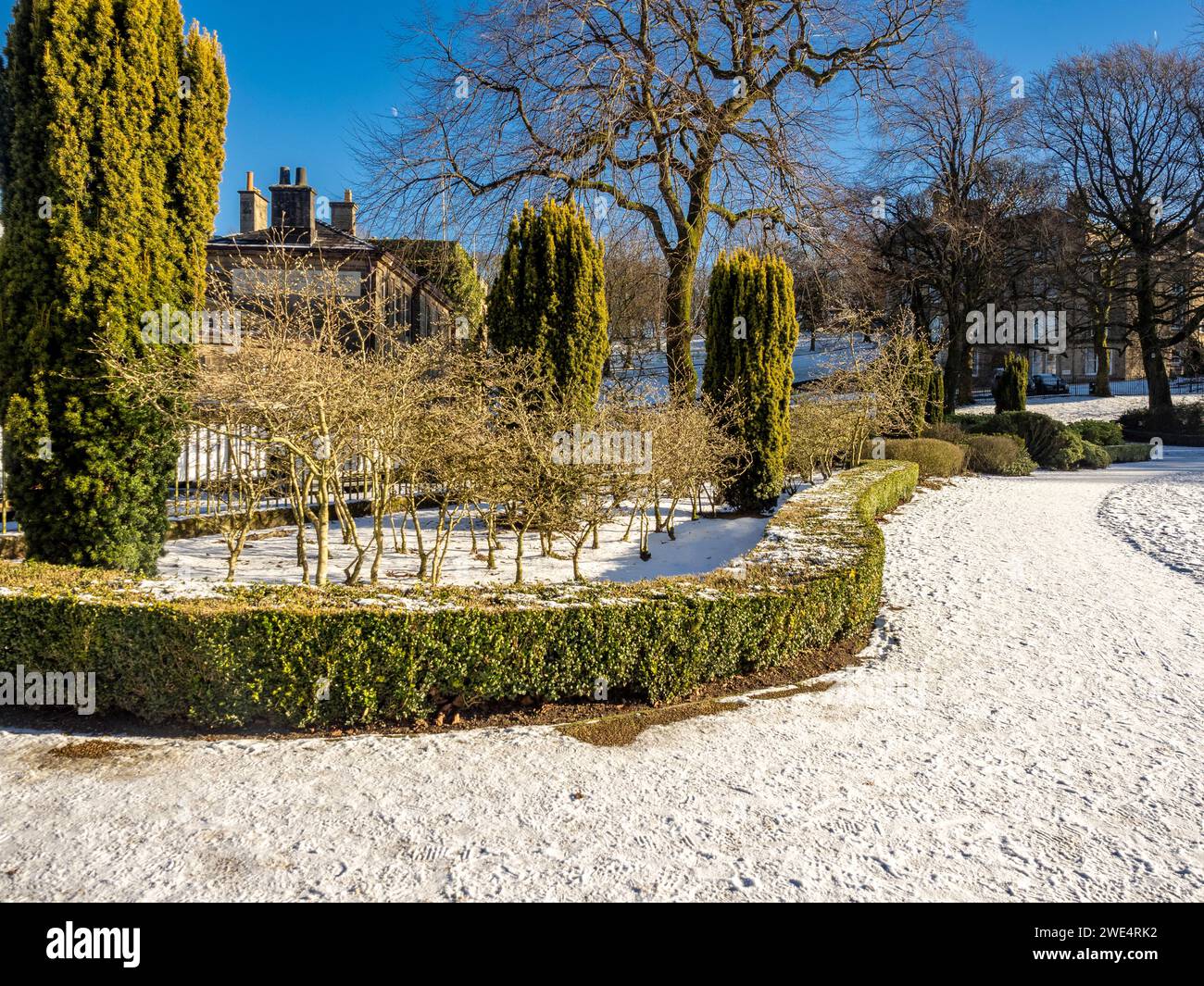 Pavilion Gardens in the snow on a sunny winter day. Buxton, Derbyshire. Stock Photo