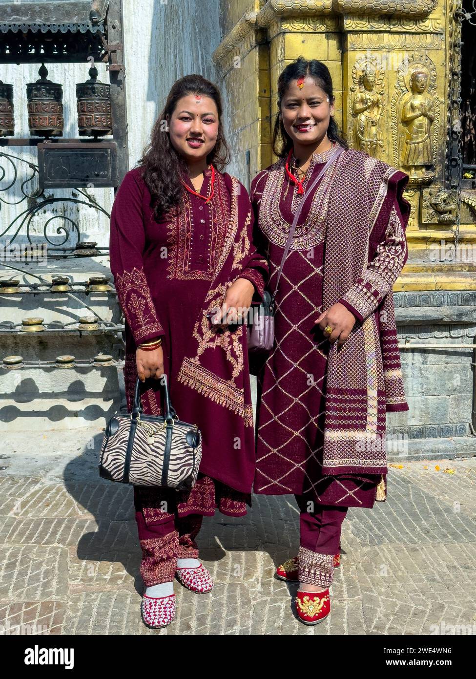 Newar women in traditional clothes on the site of Swayambhunath. Kathmandu, Nepal Stock Photo